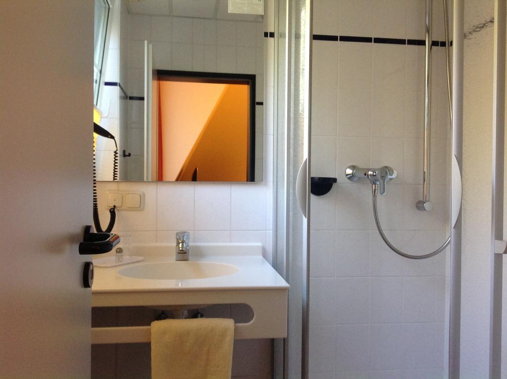 Duenenhotel Am Meer Rostock Chambre photo